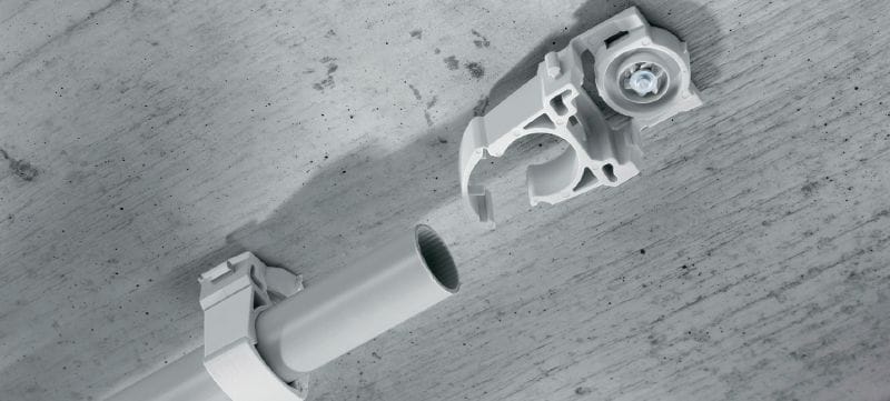 Image 2 of 4: X-EKSC MX Pipe clamp Plastic cable/conduit clamp with clip-in design and snap-lock for use with collated nails Applications 1